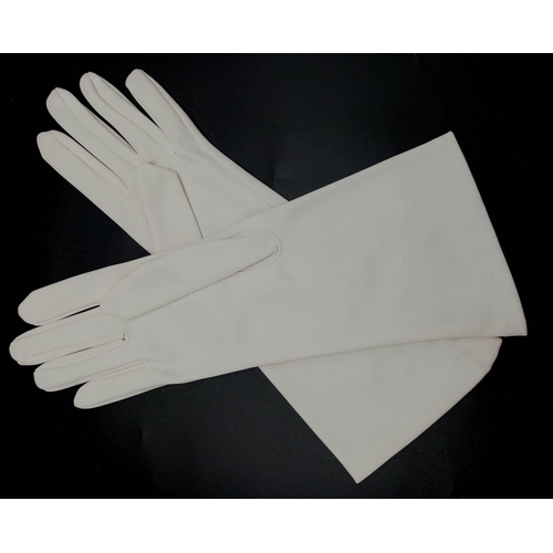723 - A PAIR OF 1950'S EMBROIDERED EVENING GLOVES WITH TRACES OF MAKE-UP STILL ON THEM  a/f