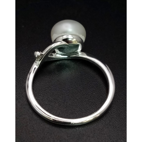 752 - New Sterling Silver Knot Design Pearl Set Ring Size M. Set with an 8mm Baroque Pearl the Ring Weighs... 