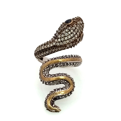 935 - A 925 Silver Snake Ring with White Stone Decoration. Size O.