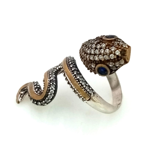 935 - A 925 Silver Snake Ring with White Stone Decoration. Size O.