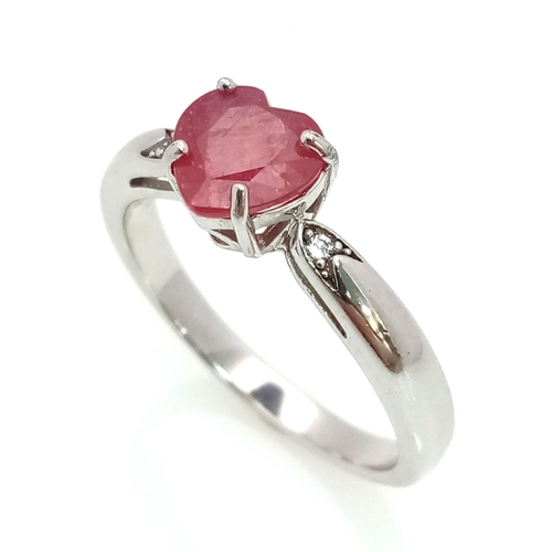 943 - New Sterling Silver and Ruby Set Ring Size R. Set with a 7mm Long Heart Cut Ruby. Ring Weighs 3.29 G... 