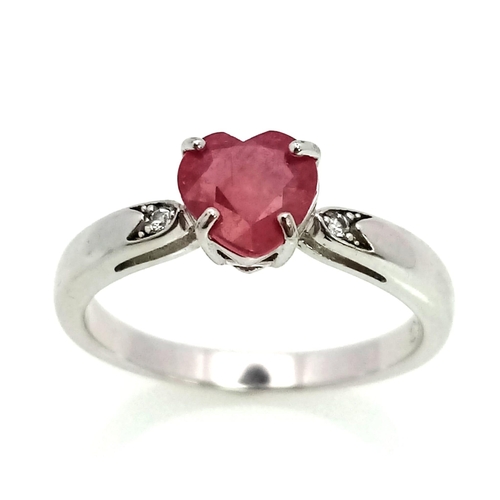 943 - New Sterling Silver and Ruby Set Ring Size R. Set with a 7mm Long Heart Cut Ruby. Ring Weighs 3.29 G... 