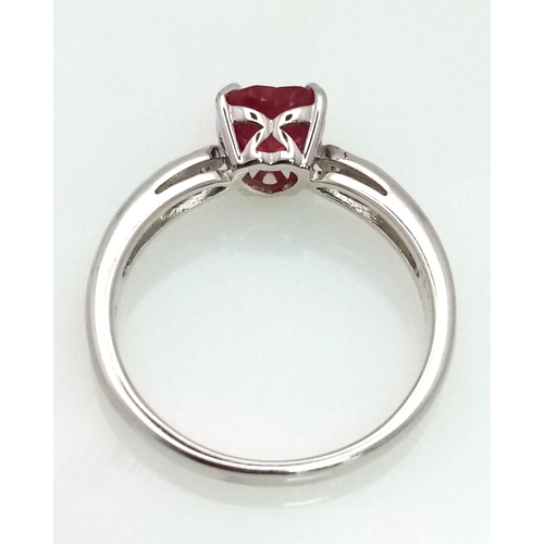 943 - New Sterling Silver and Ruby Set Ring Size R. Set with a 7mm Long Heart Cut Ruby. Ring Weighs 3.29 G... 