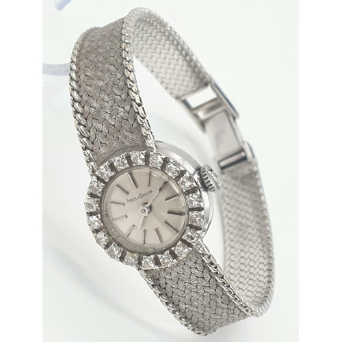 386 - A JAEGER LE COULTRE LADIES 18K WHITE GOLD AND DIAMOND MANUAL WATCH.  18mm