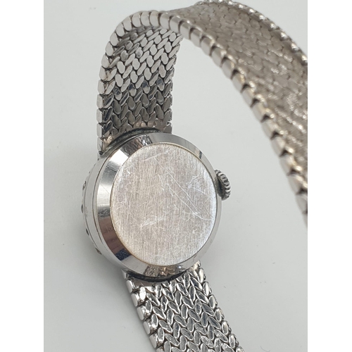 386 - A JAEGER LE COULTRE LADIES 18K WHITE GOLD AND DIAMOND MANUAL WATCH.  18mm