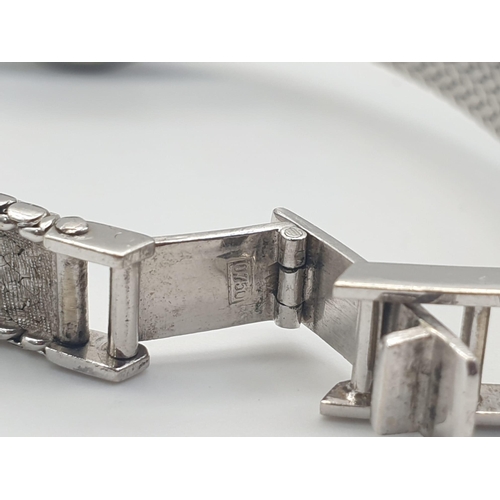 386 - A JAEGER LE COULTRE LADIES 18K WHITE GOLD AND DIAMOND MANUAL WATCH.  18mm