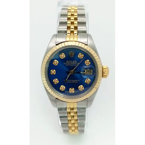 473 - A LADIES ROLEX OYSTER PERPETUAL DATEJUST IN BI-METAL WITH BLUE DIAL AND DIAMOND NUMERALS A VERY ATTR... 