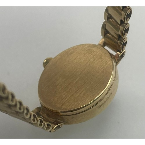 59 - A Vintage 9K Yellow Gold Sovereign Ladies Watch. 9K gold bracelet and case - 15mm. Quartz movement i... 