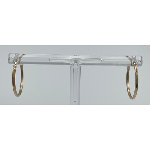 906 - Two Pairs of 9K Yellow Gold Hoop Earrings. 1.32g total weight.