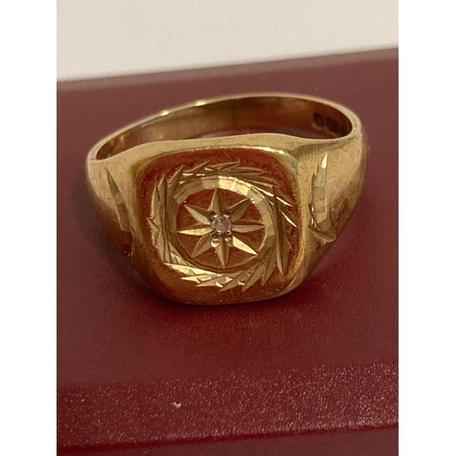 42 - Vintage Hallmarked 9 carat yellow GOLD SIGNET RING having star design to top with centre diamond det... 