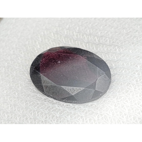 721 - A 6.44ct Tanzanian Hessonite Garnet Gemstone. AGI American Lab Certified. Comes in a sealed containe... 