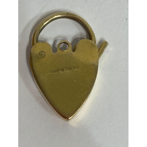 79 - 9 carat GOLD HEART PADLOCK Having Full UK hallmark. Opens and closes perfectly. 2.92 grams.