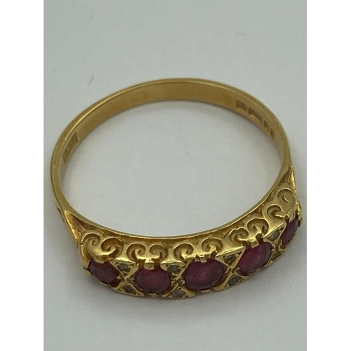 84 - Beautiful 18 carat GOLD and RUBY RING having 5 RUBIES set to top separated with Diamond detail. Full... 