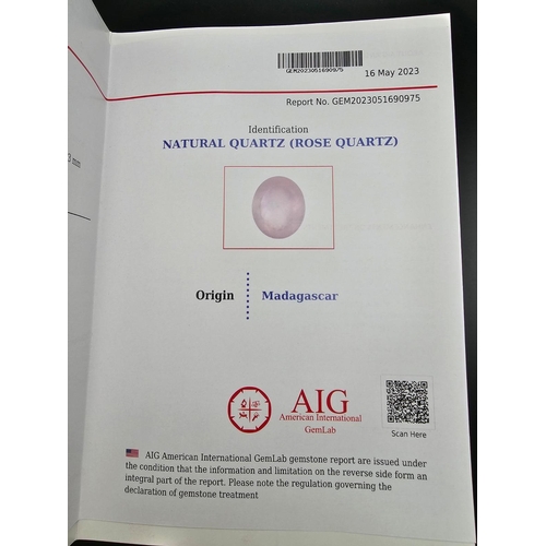 933 - A 50.33ct Madagascan Rose Quartz Oval Gemstone. AGI American Lab Certified. Comes in a sealed contai... 