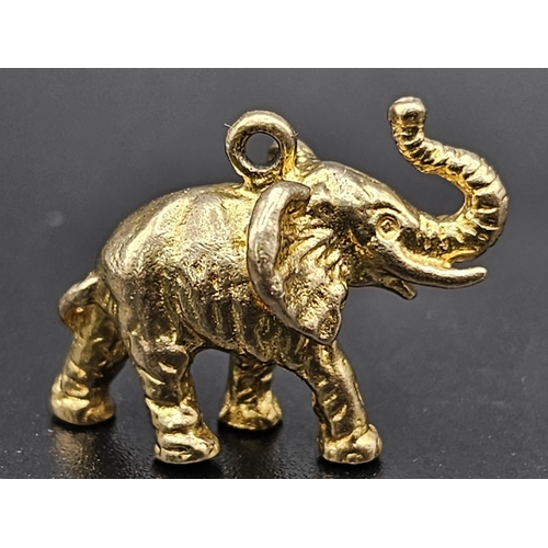 235 - 9K YELLOW GOLD ELEPHANT CHARM. 6.7G