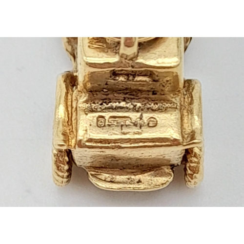 659 - 9K YELOW GOLD VINTAGE CAR CHARM.  3.3G