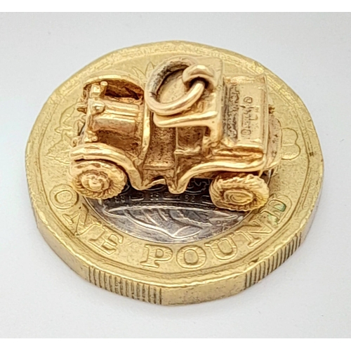 659 - 9K YELOW GOLD VINTAGE CAR CHARM.  3.3G