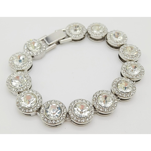 725 - SILVER TONE STONE SET TIFFANY STYLE BRACELET 37.3G