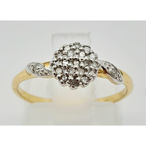 764 - 9K YELLOW GOLD DIAMOND CLUSTER RING. 0.15CT DIAMOND. TOTAL WEIGHT 1.3G. SIZE L