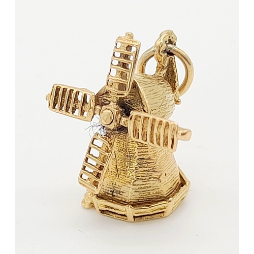 771 - 9K YELLOW GOLD WINDMILL CHARM WITH SPINNING WHEEL 3.37G