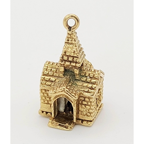 778 - 9K YELLOW GOLD CHURCH CHARM THAT OPENS TO REVEAL BRIDE AND GROOM.  2.9G