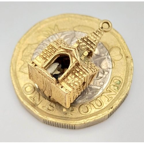 778 - 9K YELLOW GOLD CHURCH CHARM THAT OPENS TO REVEAL BRIDE AND GROOM.  2.9G