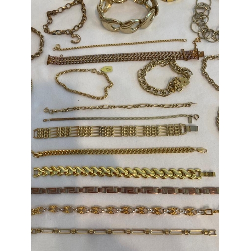 392 - Large Selection of better quality gold tone and gold plated Bracelets.