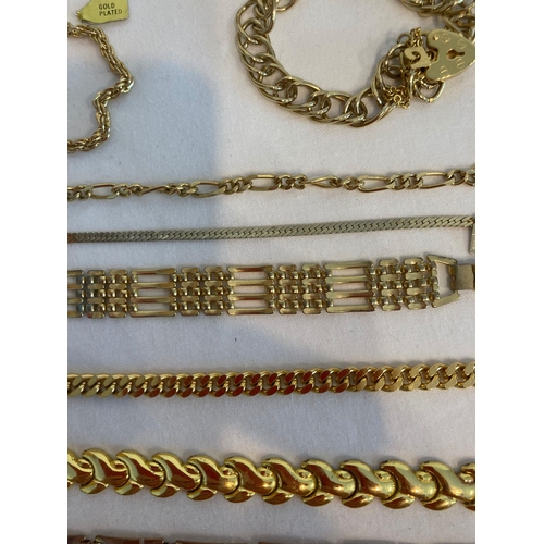 392 - Large Selection of better quality gold tone and gold plated Bracelets.