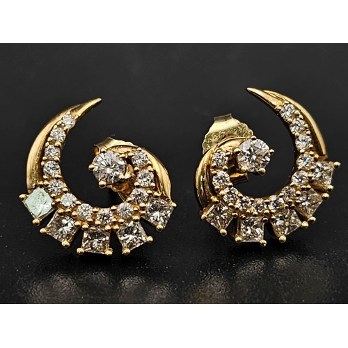 68 - 18K YELLOW GOLD DIAMOND SET SWIRL STUD EARRINGS. 0.90CT DIAMONDS. TOTAL WEIGHT 4.09G