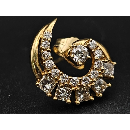 68 - 18K YELLOW GOLD DIAMOND SET SWIRL STUD EARRINGS. 0.90CT DIAMONDS. TOTAL WEIGHT 4.09G