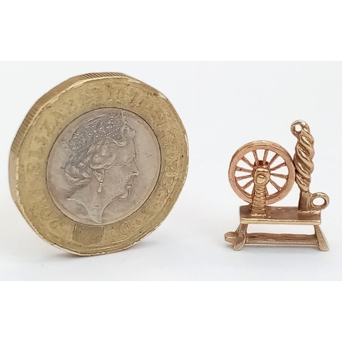 916 - 9K YELLOW GOLD SPINNING WHEEL YARNING CHARM 1.5G