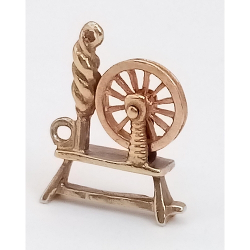 916 - 9K YELLOW GOLD SPINNING WHEEL YARNING CHARM 1.5G