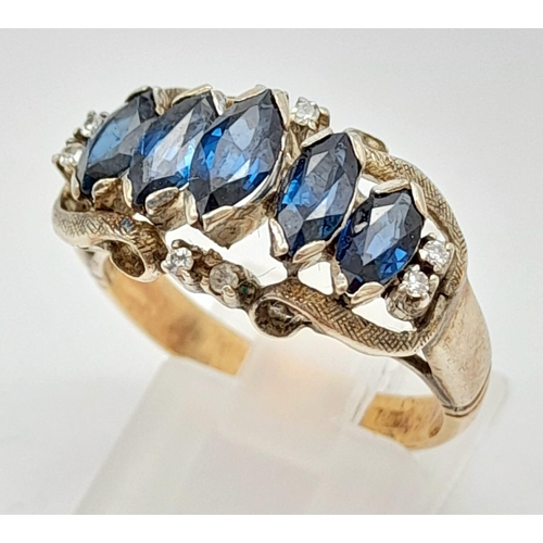 1616 - A STUNNING VINTAGE 18K GOLD SAPPHIRE AND DIAMOND RING .  5.3gms   size P