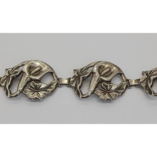 1618 - A romantic Art Nouveau sterling silver bracelet with Arum lilies (or calla lilies as they are most c... 