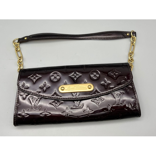 Sold at Auction: A Louis Vuitton Burgundy Patent Leather Handbag