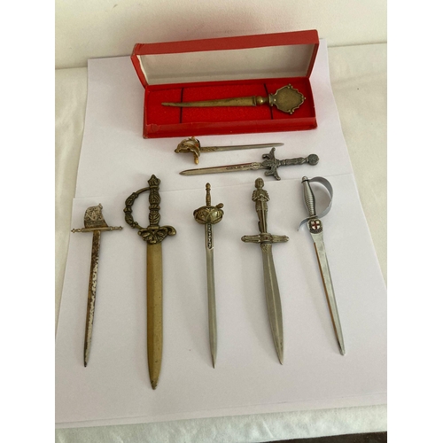 441 - Large collection of vintage Sword themed letter openers, To include rapier, epee, sabre, rare Broads... 