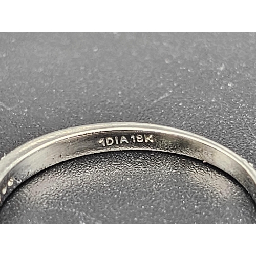 470 - 18k white gold channel set diamond half eternity ring (dia:0.20ct) 1.76g, size M