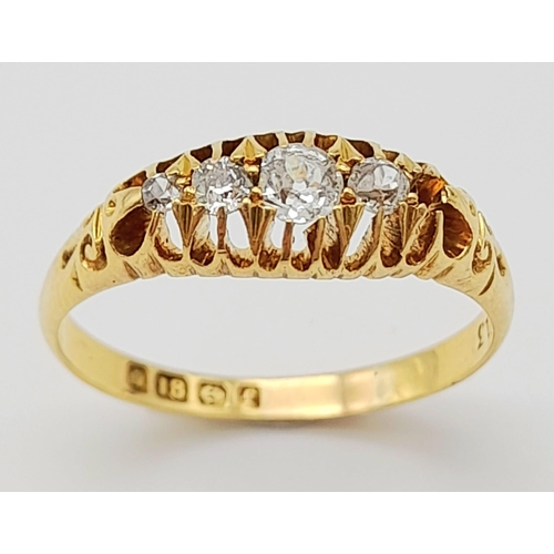 637 - A Vintage 18K Yellow Gold Diamond Ring. Four bright, white round cut diamonds (unfortunately one is ... 