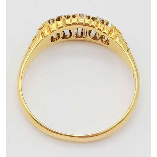 637 - A Vintage 18K Yellow Gold Diamond Ring. Four bright, white round cut diamonds (unfortunately one is ... 