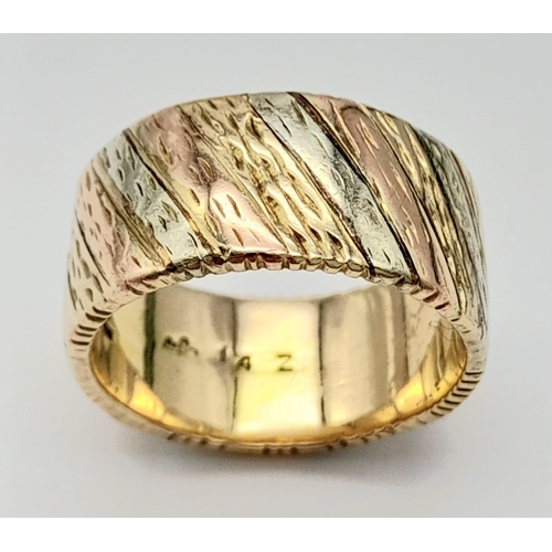 9 - A 9K Tri-Colour Gold Band Ring. Diagonal waves of yellow, white and rose gold. Size Q. 10.21g