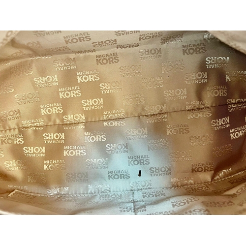 1158 - Michael Kors Cream Monogram Bag with Gold Tone Hardware. 19cm x 31cm x 12cm.