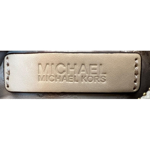 1158 - Michael Kors Cream Monogram Bag with Gold Tone Hardware. 19cm x 31cm x 12cm.