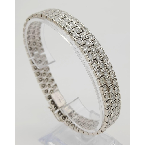 113 - A Stunning Platinum Diamond Bracelet, With 18ct of Diamonds. Total Weight 91g . 22cm in Length.