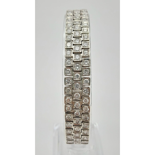 113 - A Stunning Platinum Diamond Bracelet, With 18ct of Diamonds. Total Weight 91g . 22cm in Length.