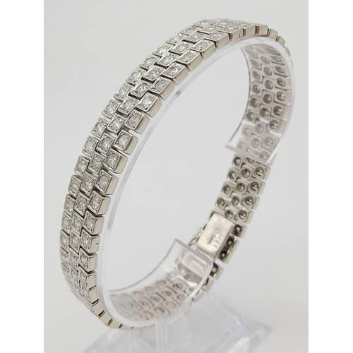 113 - A Stunning Platinum Diamond Bracelet, With 18ct of Diamonds. Total Weight 91g . 22cm in Length.