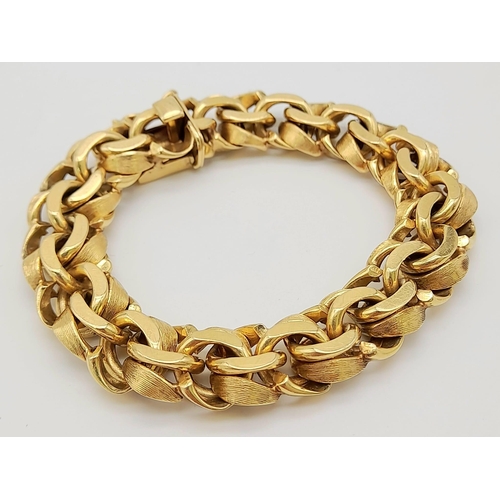 2 - A Solid 14K Yellow Gold Intricate Linked Statement Gents Bracelet. 20cm. 74.91g.