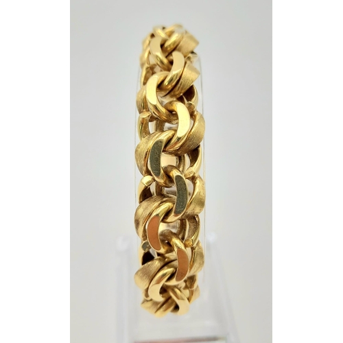 2 - A Solid 14K Yellow Gold Intricate Linked Statement Gents Bracelet. 20cm. 74.91g.