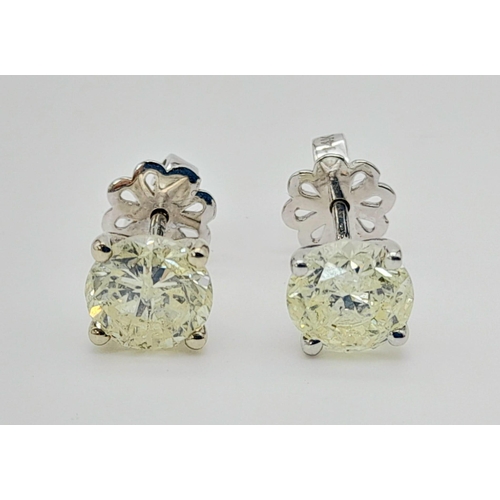 361 - A Pair of 1.2ct Diamond Stud Earrings.  Total weight 2.04g