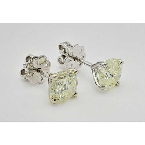361 - A Pair of 1.2ct Diamond Stud Earrings.  Total weight 2.04g