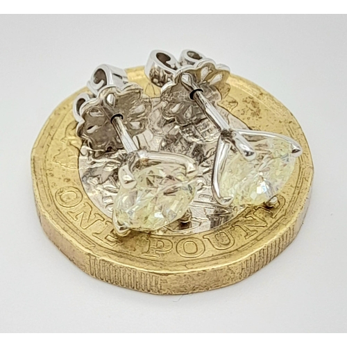 361 - A Pair of 1.2ct Diamond Stud Earrings.  Total weight 2.04g